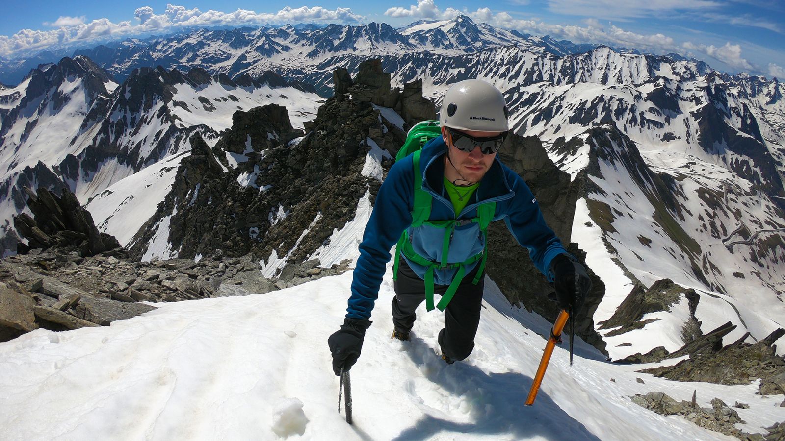 On the Pizzo Nero with ropes, carabiners, ice axes, helmet and gloves. 