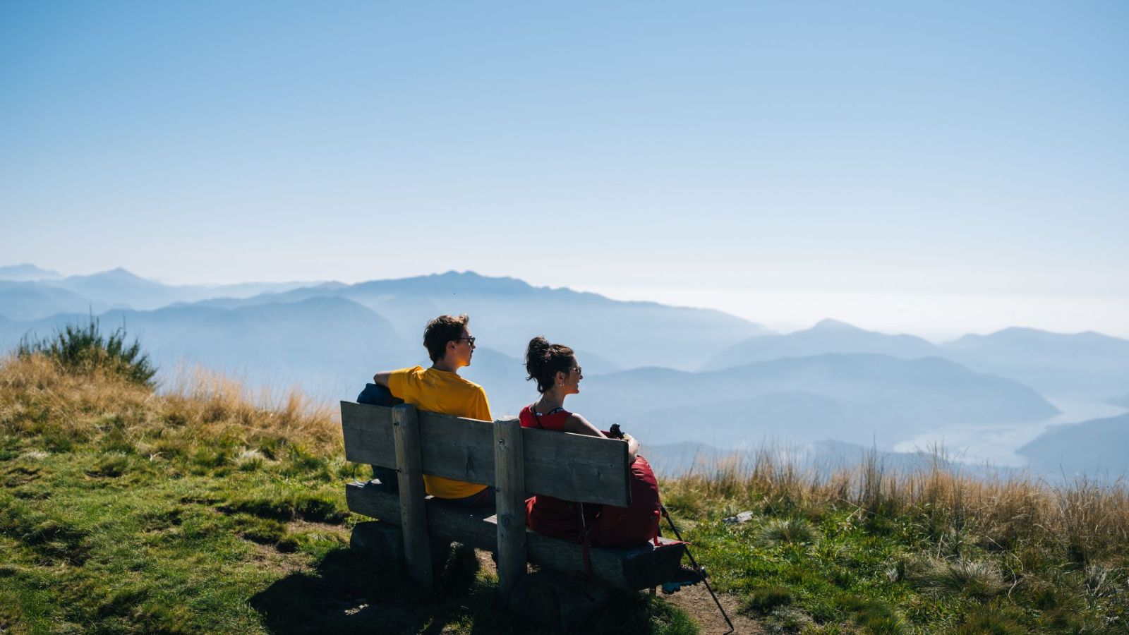 A panoramic bench invites to take a break near Monte Lema