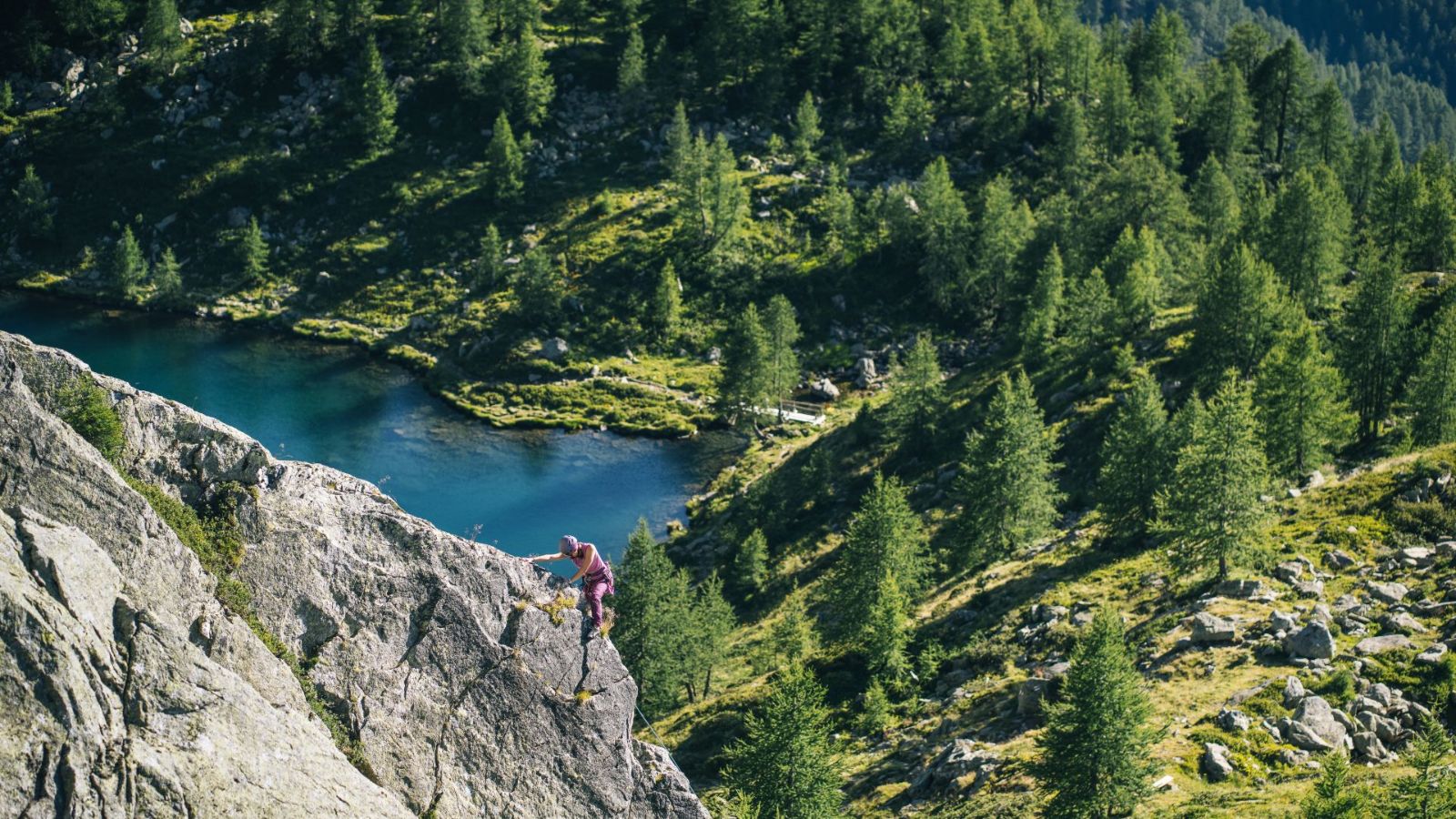 Alpine climbing with Lake Mognola in the background